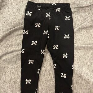 Janie and Jack Black Leggings with White Bow Print